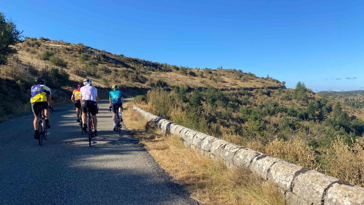 A bunch of cyclists on their way through the Causses plateaus.