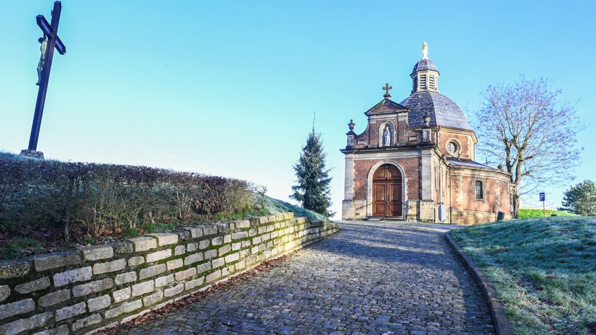 climbing view on the narrow road with cobblestones of the 