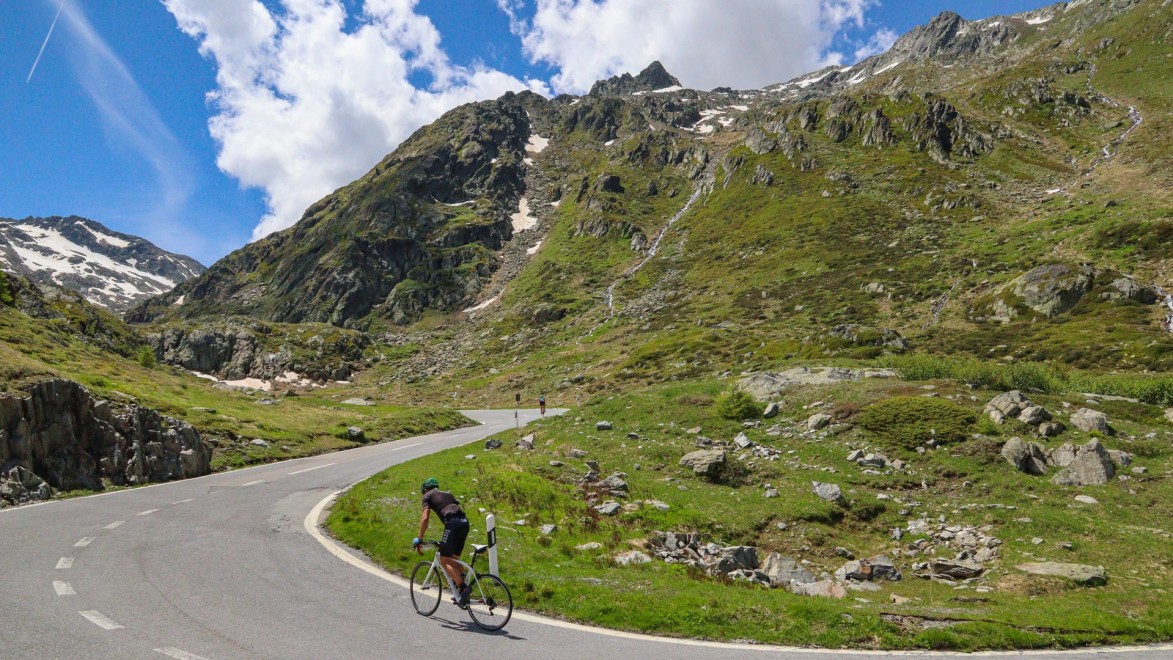 cyclist climbing the col of the Great Saint Bernard
