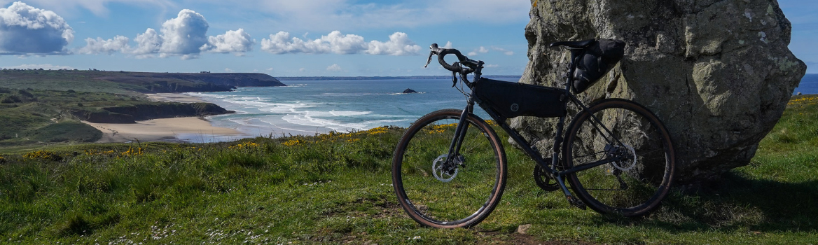 gravel bike with bikepacking equipment in Brittany